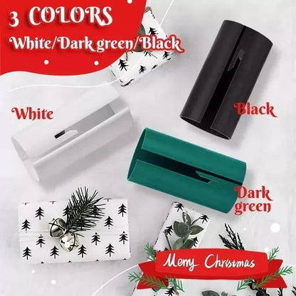 Christmas wrapping paper cutter in white dark green and black