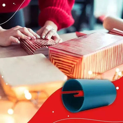 Wrapping a Christmas present with paper cutter