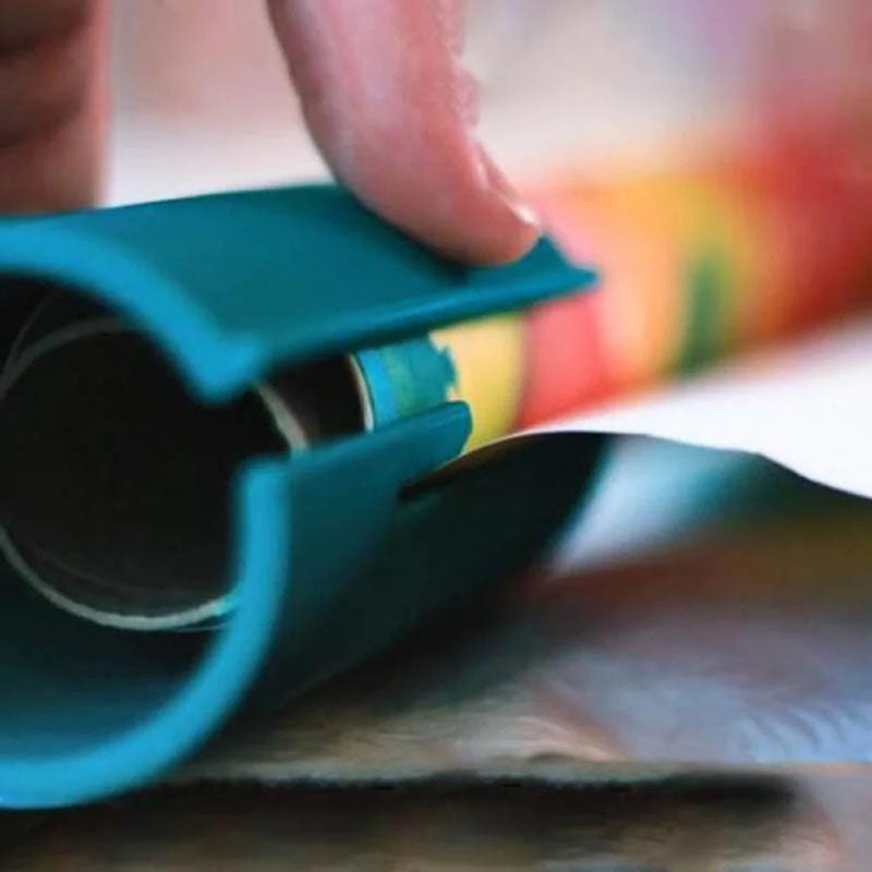 Embedded blade cutting gift wrap paper